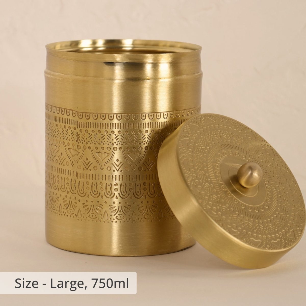 Handcrafted pure brass storage jar with traditional etching, ideal for kitchen storage, adding timeless Indian elegance.