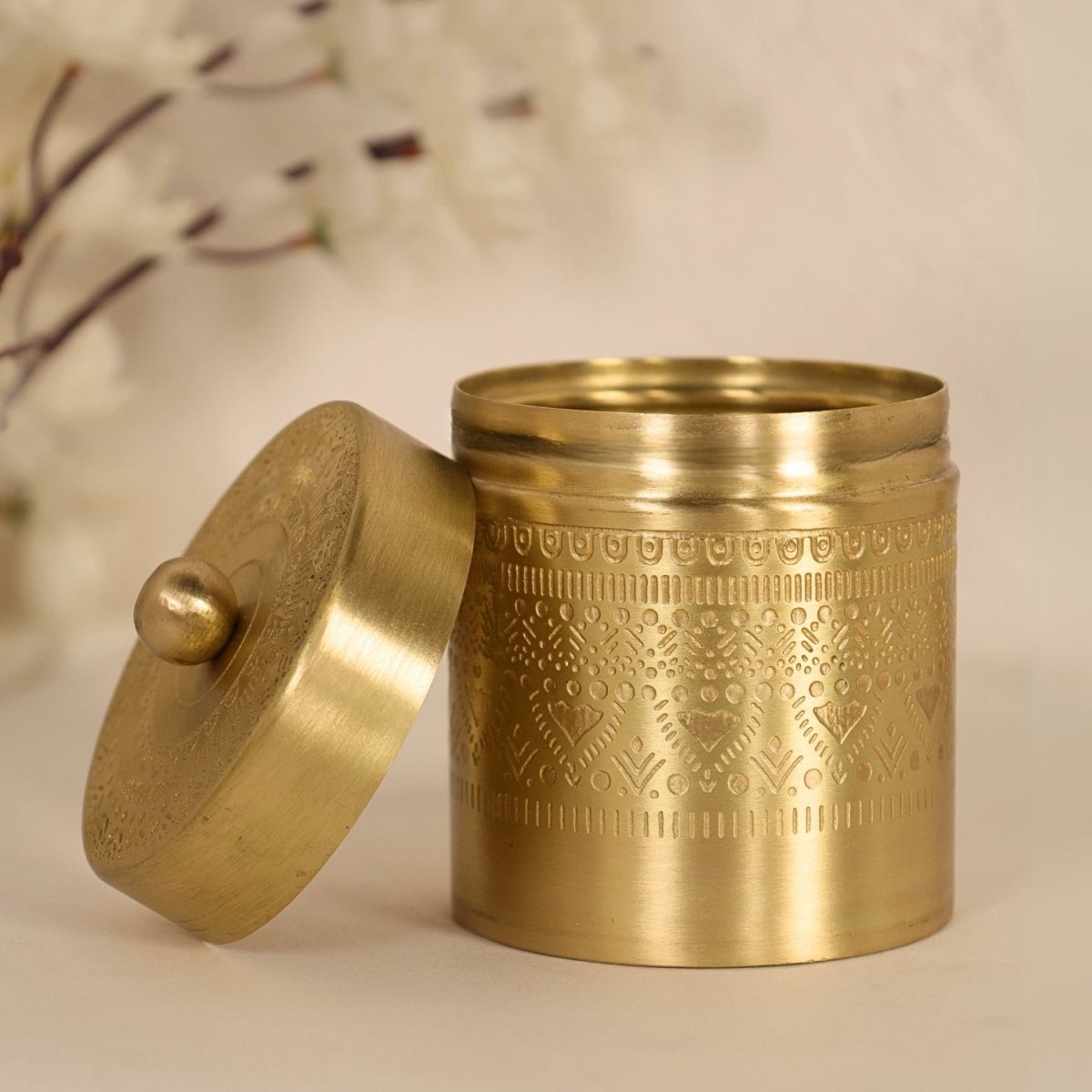 Handcrafted pure brass storage jar with traditional etching, ideal for kitchen storage, adding timeless Indian elegance.