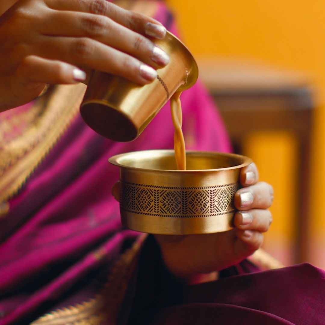 Handcrafted pure brass kitchen masala box with Kanjeevaram-inspired etching, adding timeless Indian elegance.