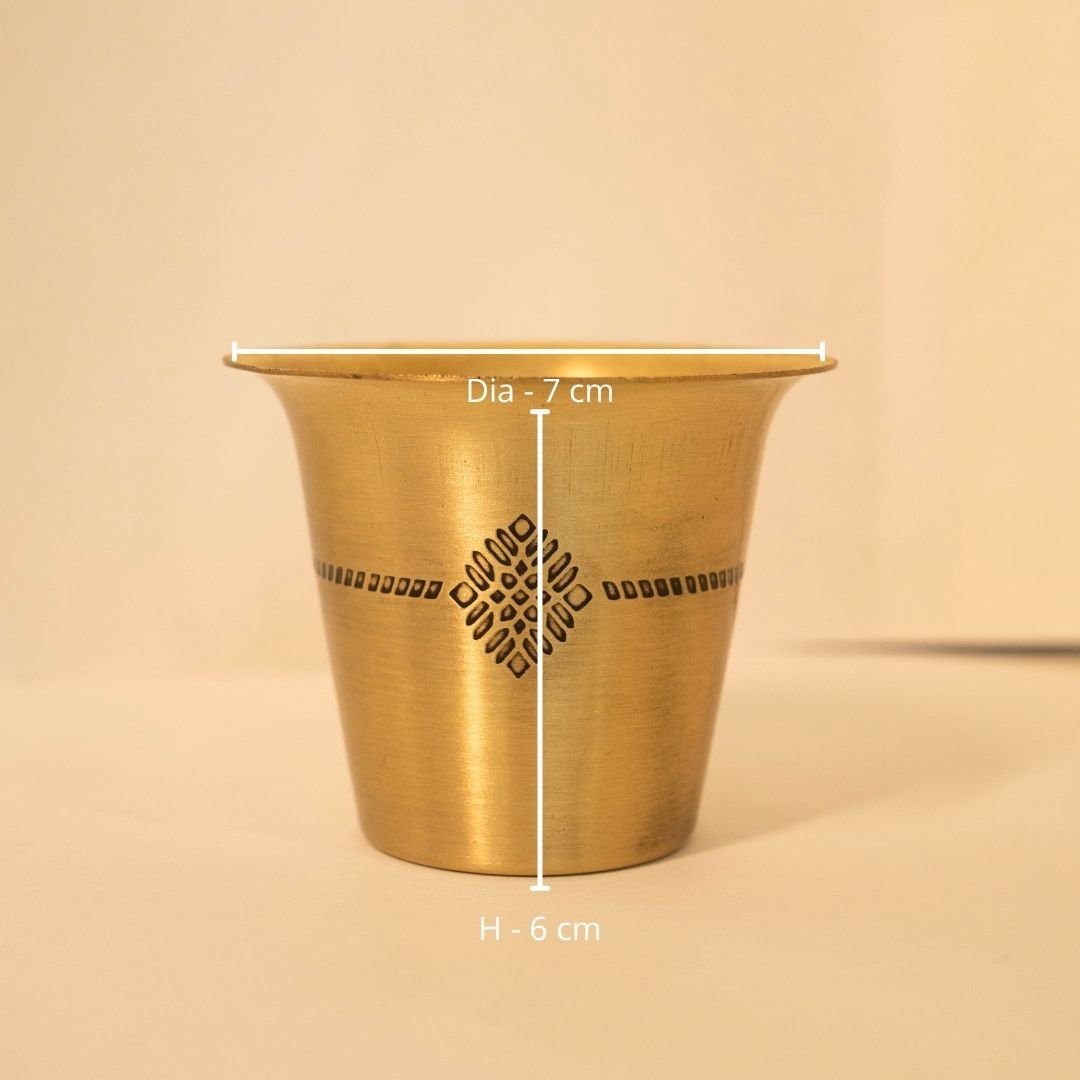 Handcrafted pure brass kitchen masala box with Kanjeevaram-inspired etching, adding timeless Indian elegance.