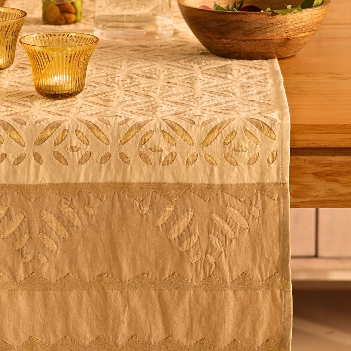 Elegant off white and taupe table runner featuring intricate appliqué work. Handcrafted for timeless dining décor—perfect for modern and classic homes.