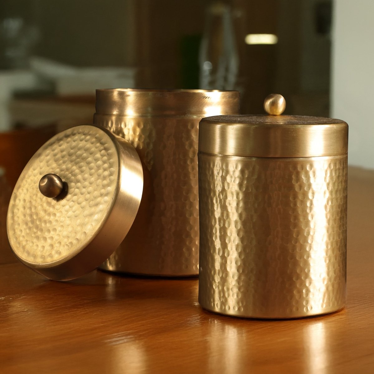 Handcrafted pure brass storage jar with traditional etching, ideal for kitchen storage, adding timeless Indian elegance.