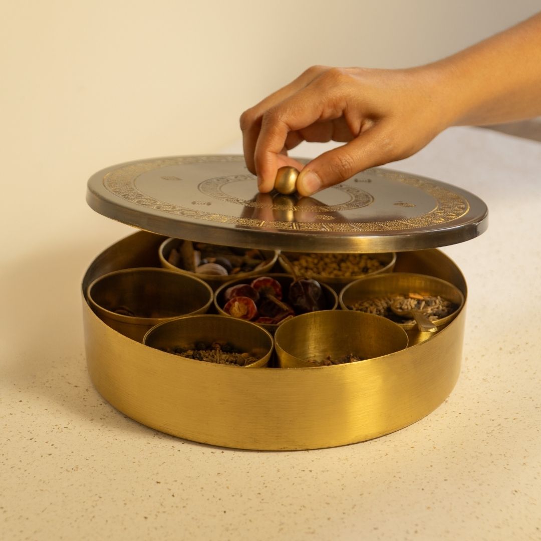 Kitchen masala box or spice box made with Pure Brass in an Antique Kanjeevaram Design Theme.