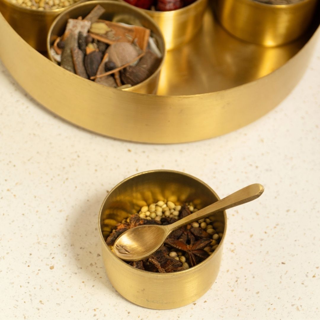 Kitchen masala box or spice box made with Pure Brass in an Antique Kanjeevaram Design Theme.