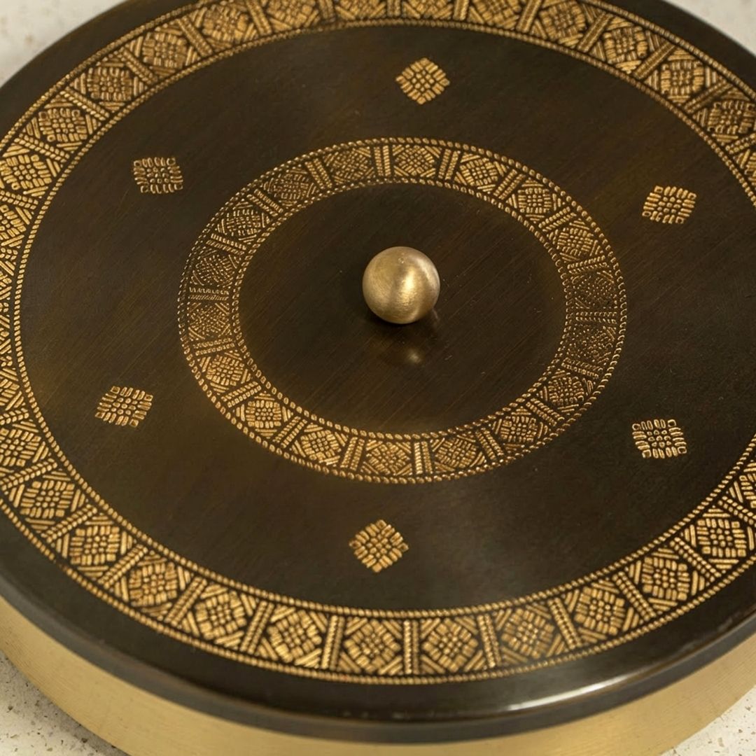Kitchen masala box or spice box made with Pure Brass in an Antique Kanjeevaram Design Theme.