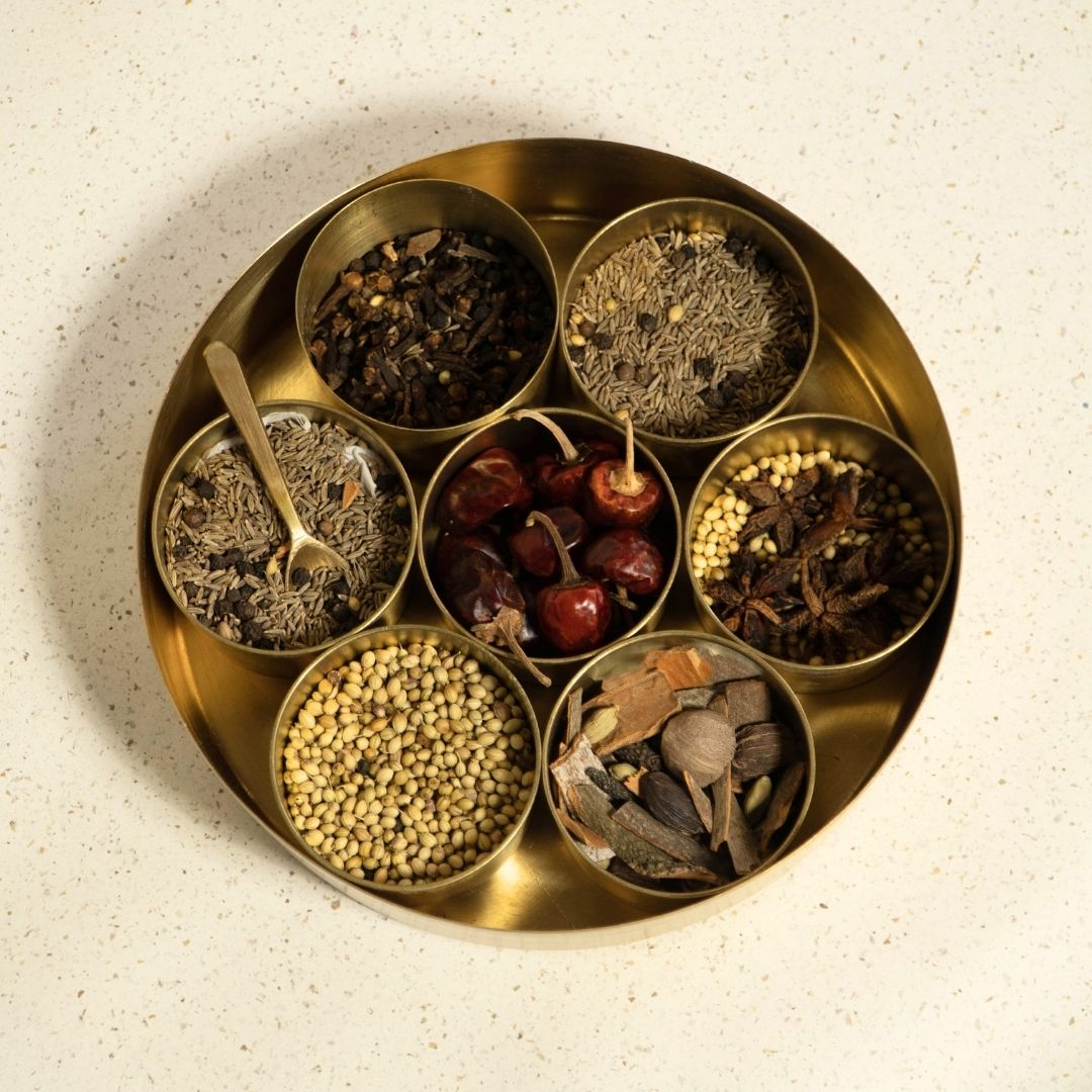 Kitchen masala box or spice box made with Pure Brass in an Antique Kanjeevaram Design Theme.