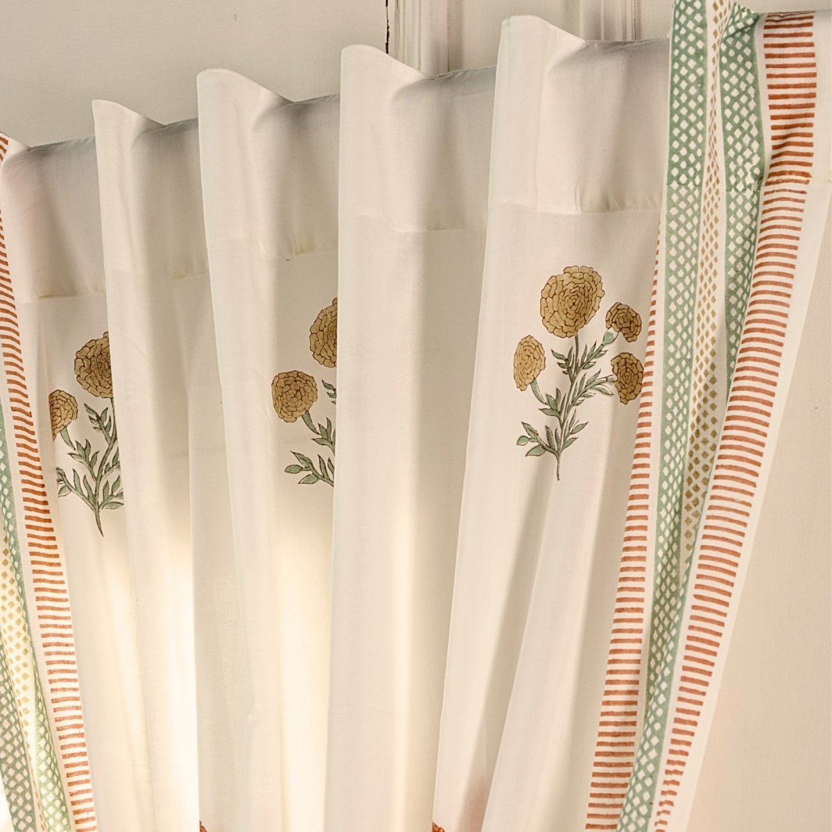 Pure Cotton Sheer Curtains in floral patterns in Rust Mustard and teal colours, available in 5ft and 7ft
