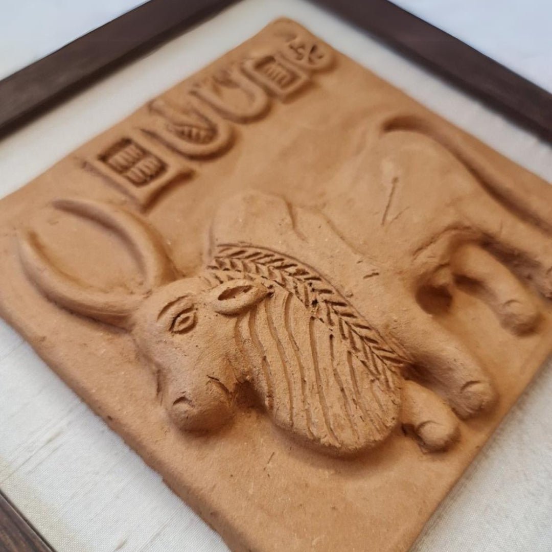 Terracotta wall hanging replica of Harappan Bull Seal Replica with Frame Length 8 inches Width 8 inches including frame