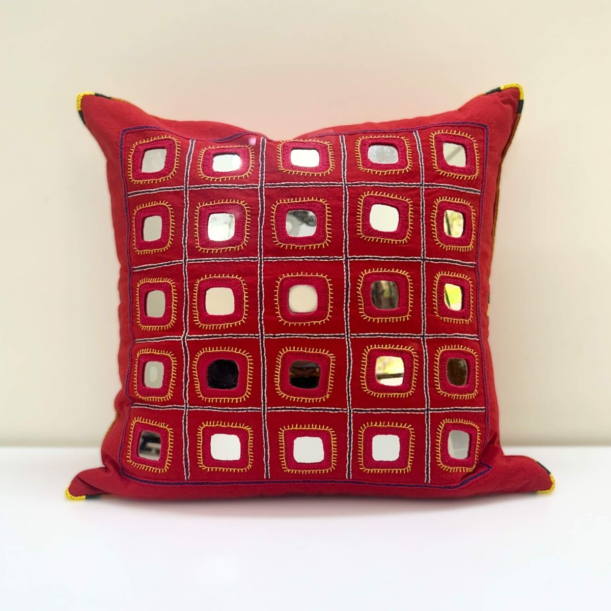 Red Lambani Starlight cushion cover, showcasing traditional artistry
