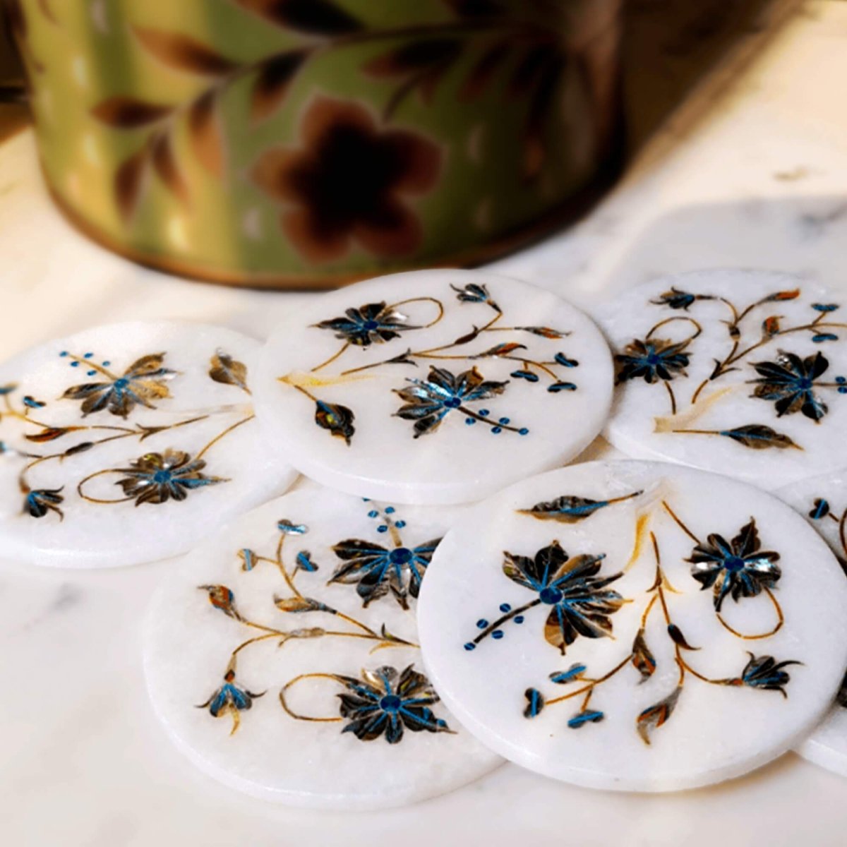 Mother of pearl on marble inlay coasters inspired by the Taj Mahal, adding opulence to your decor