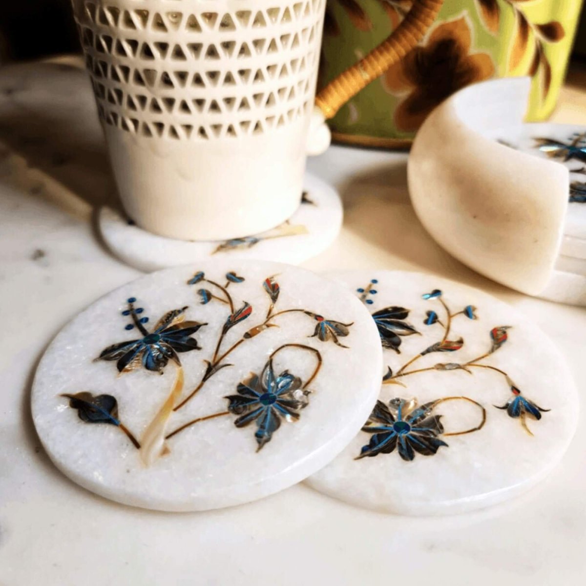 Mother of pearl on marble inlay coasters inspired by the Taj Mahal, adding opulence to your decor