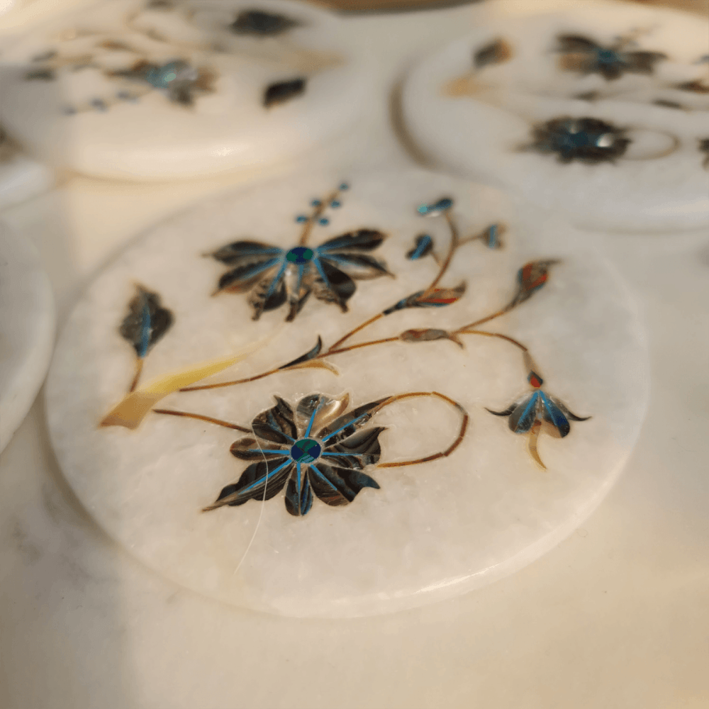 Mother of pearl on marble inlay coasters inspired by the Taj Mahal, adding opulence to your decor