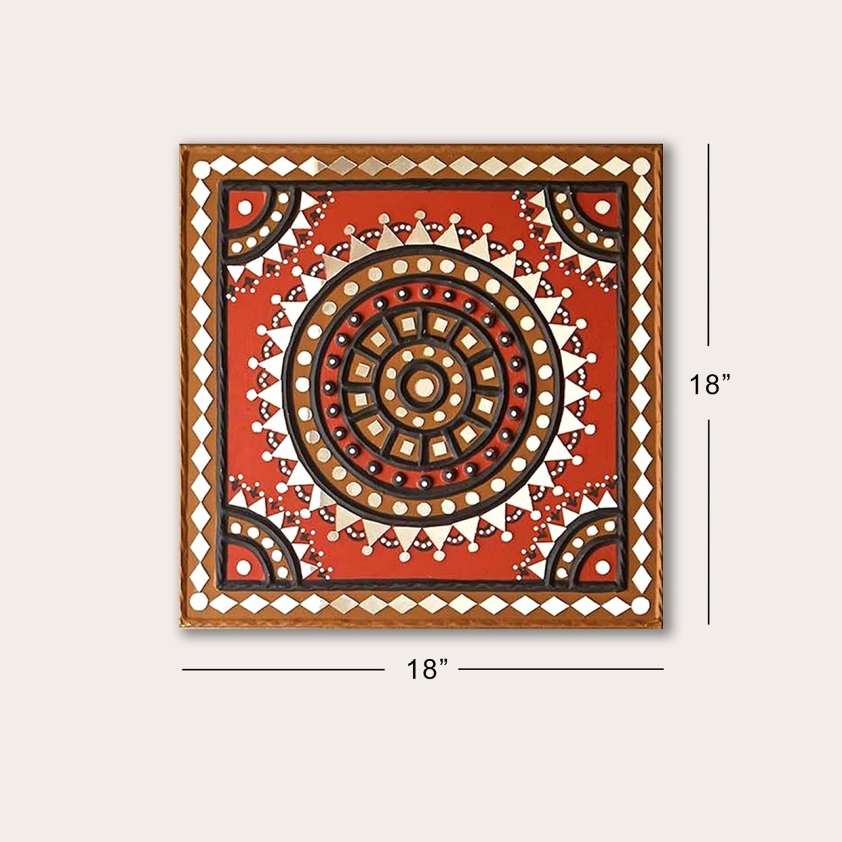 Handcrafted square mud wall art in red and black, adding a bold and artistic touch