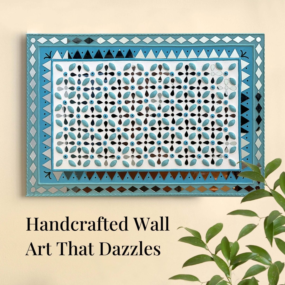 Handmade ocean blue Lippan wall hanging with mud and mirror work from Kutch.