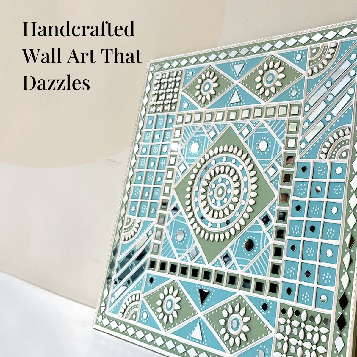 Handmade ocean blue sparkles lippan wall hanging with mud and mirror work from Kutch.